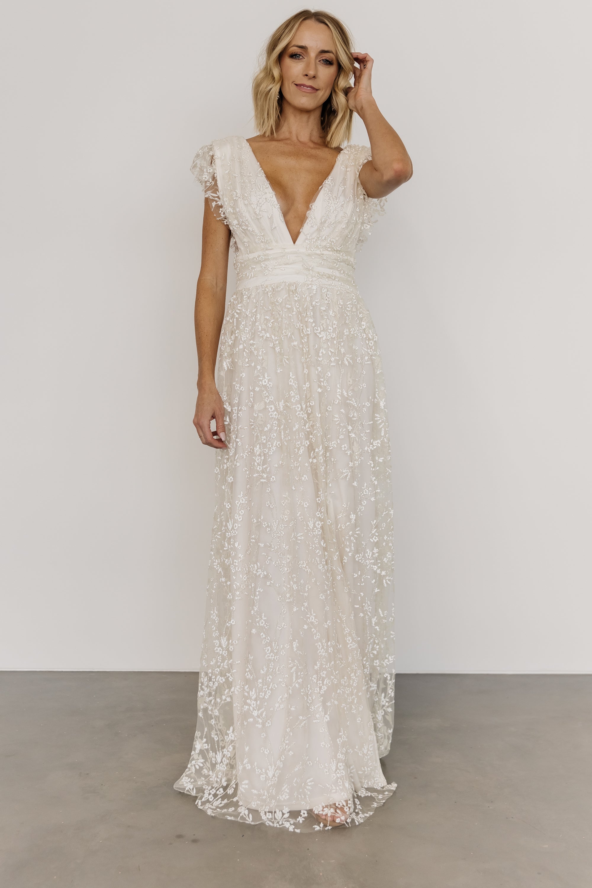 Ivory Shimmer Gown with Floral Pattern & V-Neckline – Baltic Born
