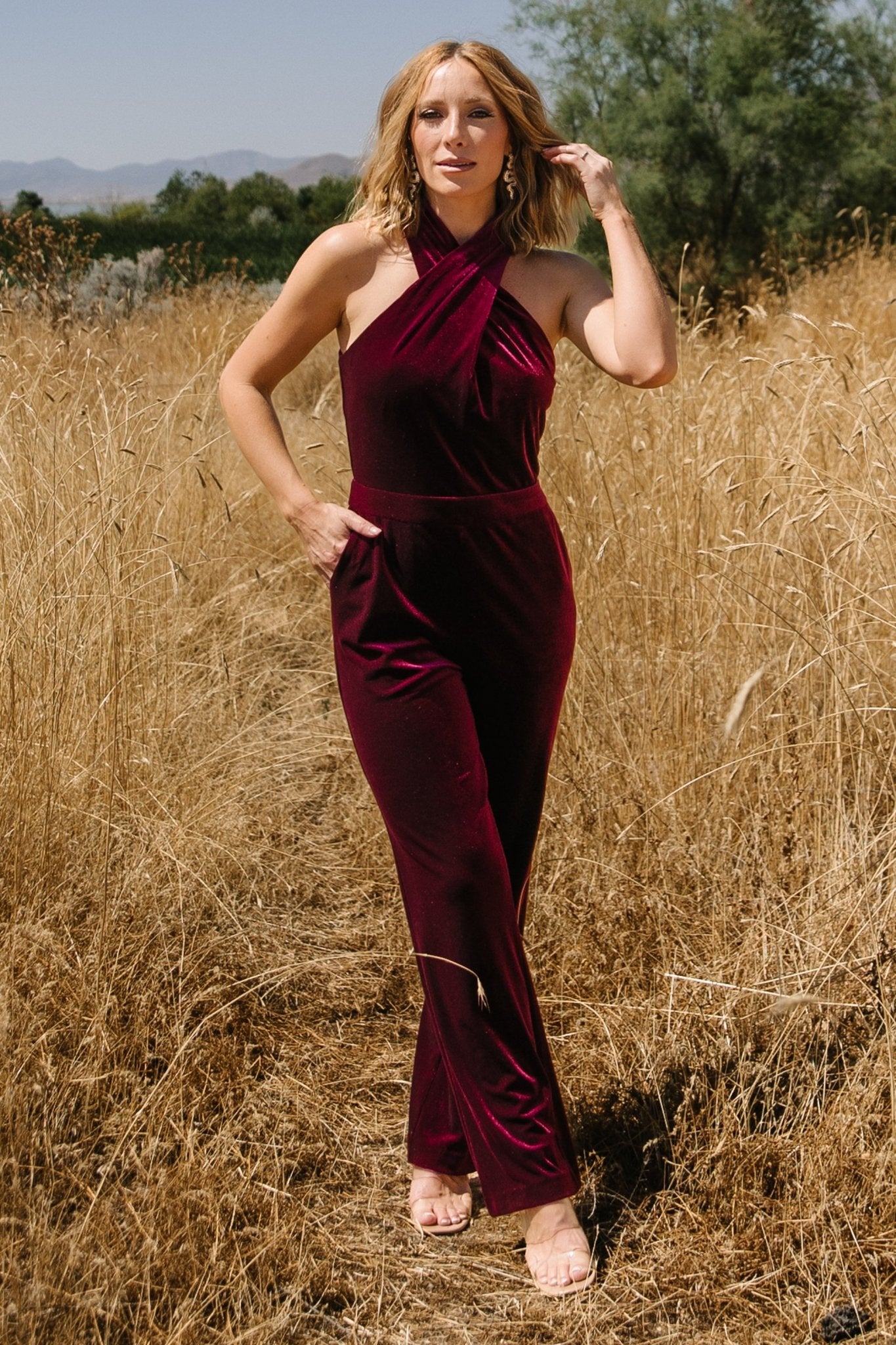 Burgundy Velvet Halter Jumpsuit by Baltic Born | Cross Neck Design