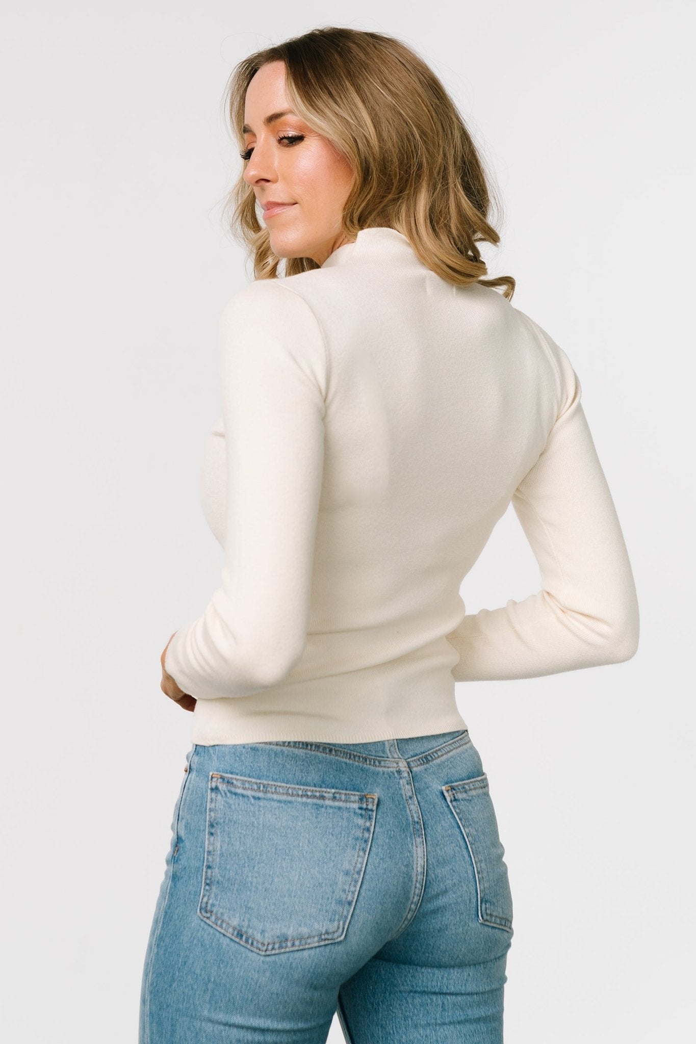 Ivory Frances Knit Top with High Neck & Lettuce Trim | Baltic Born