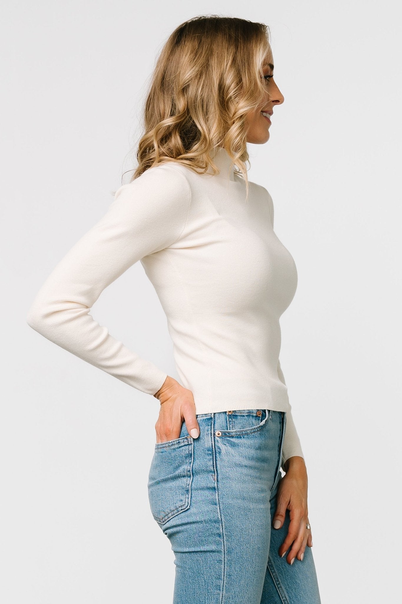 Ivory Frances Knit Top with High Neck & Lettuce Trim | Baltic Born