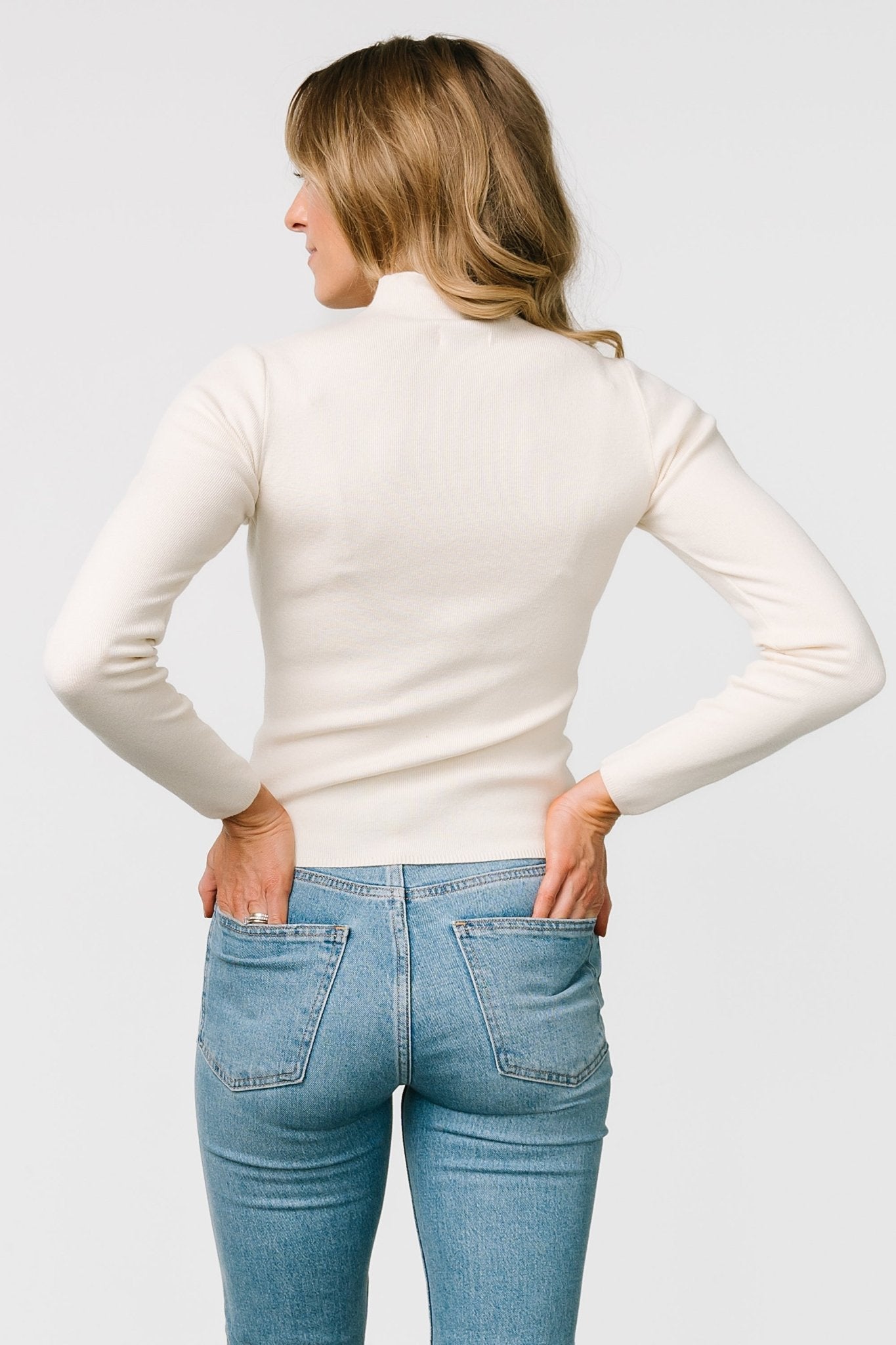 Ivory Frances Knit Top with High Neck & Lettuce Trim | Baltic Born